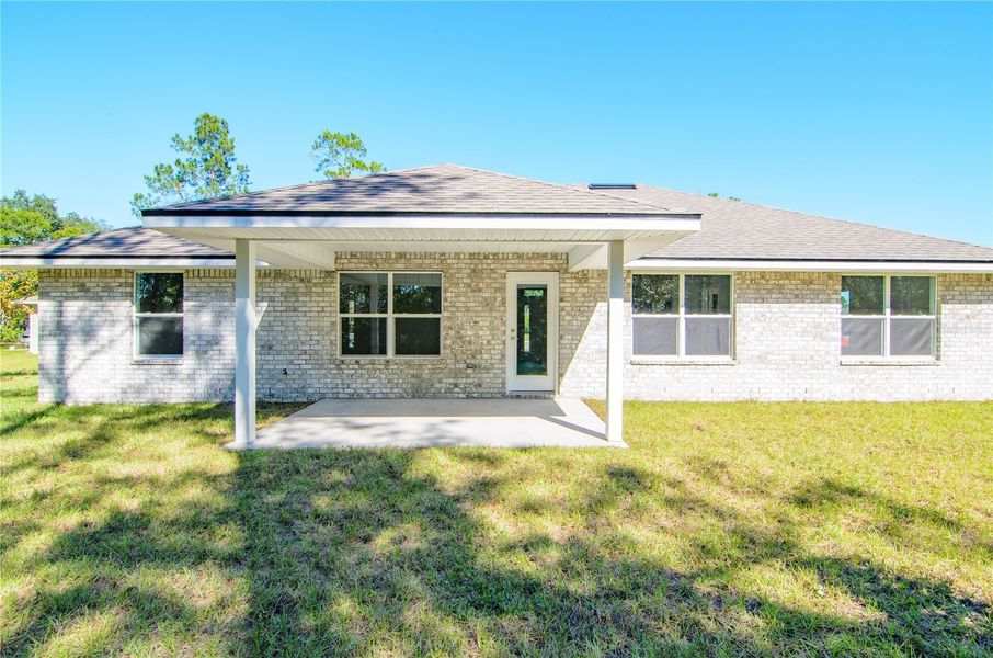 Exterior details and patio area of a home in Palm Coast, Palm Coast (Image 3).