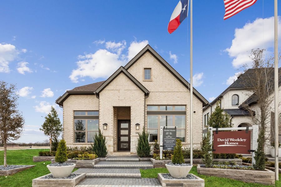 Front exterior of a new home in Mantua Point Gardens, Van Alstyne, TX, highlighting curb appeal (Image 2). Front exterior of a new home in Mantua Point Gardens, Van Alstyne, TX, highlighting curb appeal (Image 2).