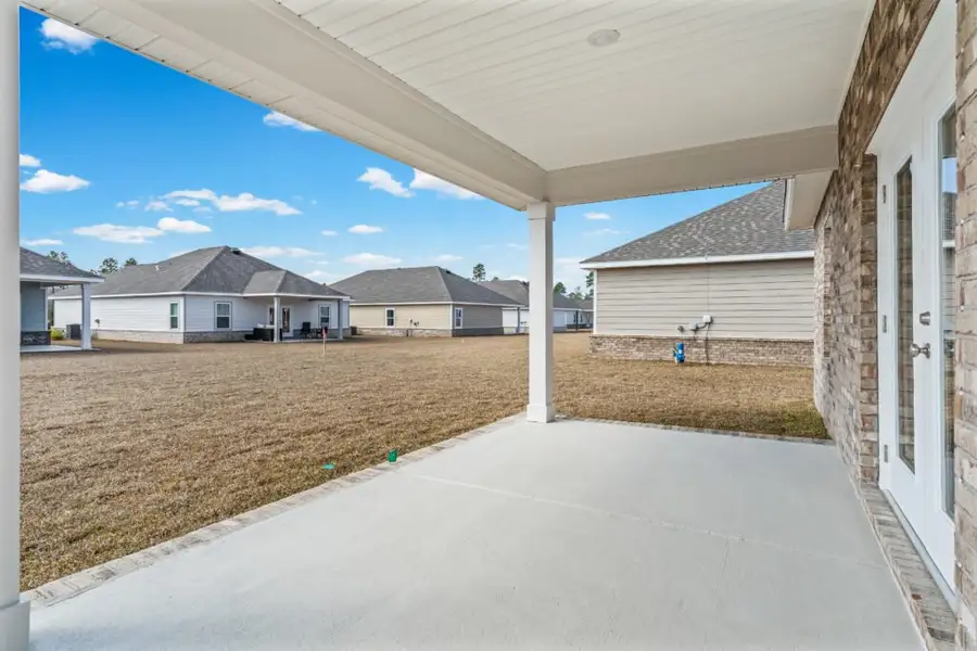 Exterior details and patio area of a home in Natureview, Freeport (Image 4).