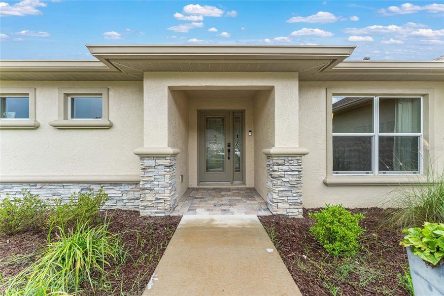 Front exterior of a new home in , Inverness, FL, highlighting curb appeal (Image 26).