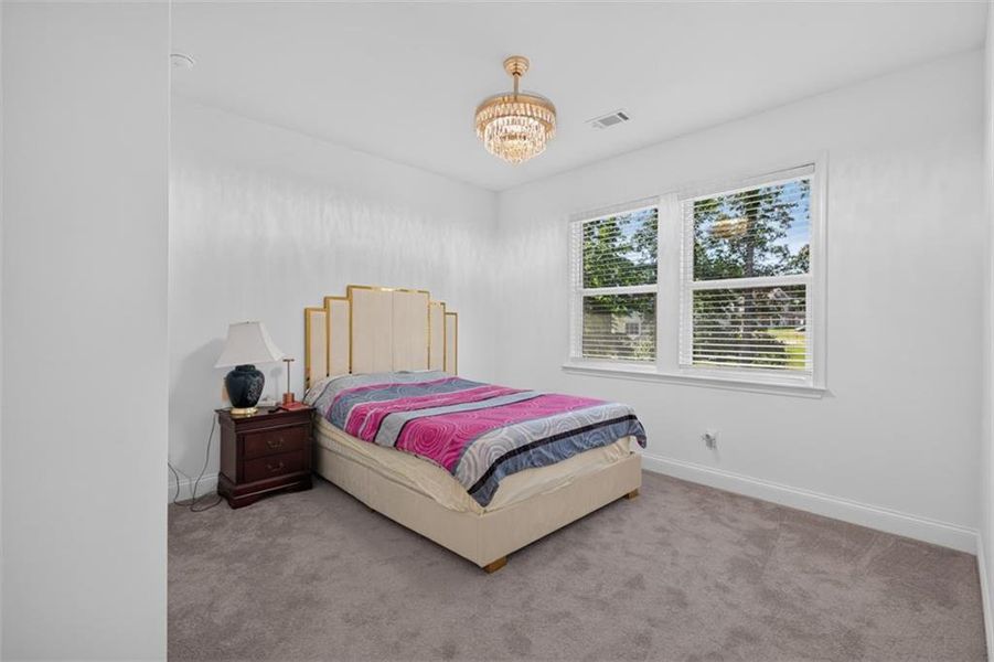 Furnished interior view inside a new home in Bailey Fence, Dacula (Image 43).