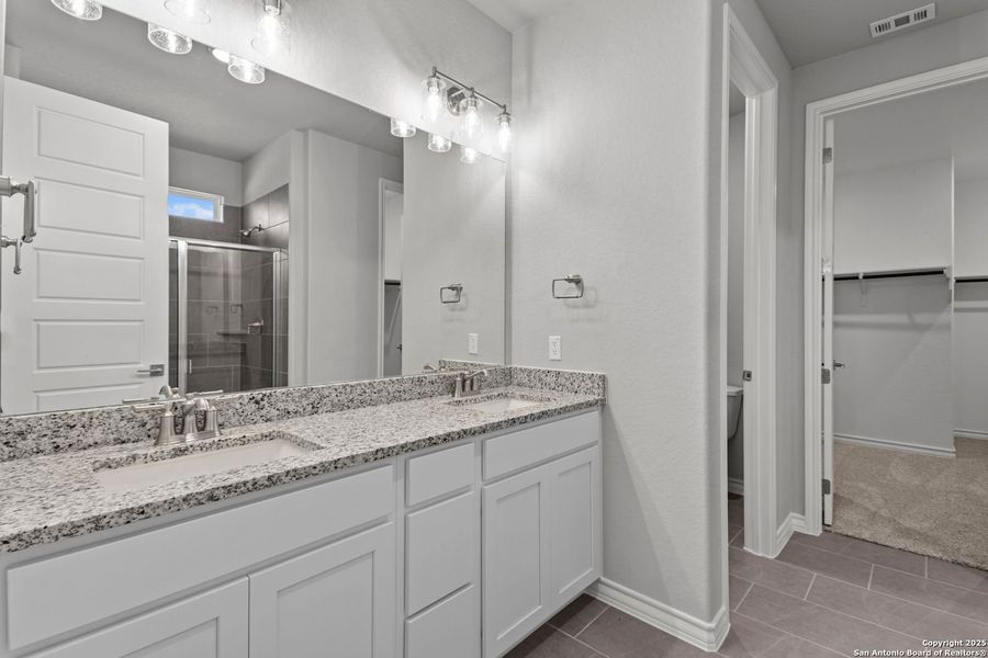 Furnished interior view inside a new home in The Reserve at Potranco Oaks, Castroville (Image 61).