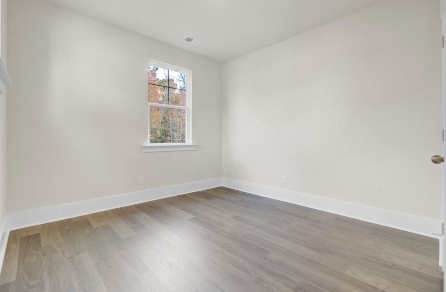 Spacious, unfurnished interior of a new home in Indigo Grove Single Family Homes, Johns Island (Image 48).