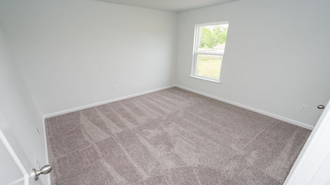 Representative unfurnished interior of a home built from the ROBIE by D.R. Horton in Island Green, Myrtle Beach (Image 37).