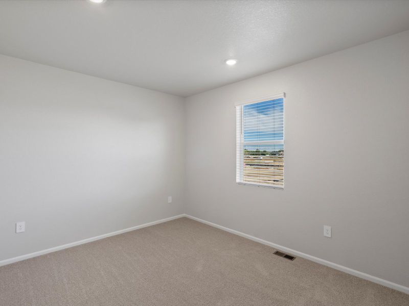 Spacious, unfurnished interior of a new home in Poudre Heights: The Alpine Collection, Windsor (Image 12).