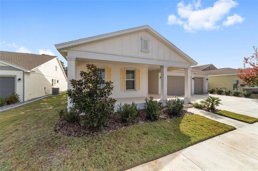 Front exterior of a new home in Calesa Township, Ocala, FL, highlighting curb appeal (Image 34).