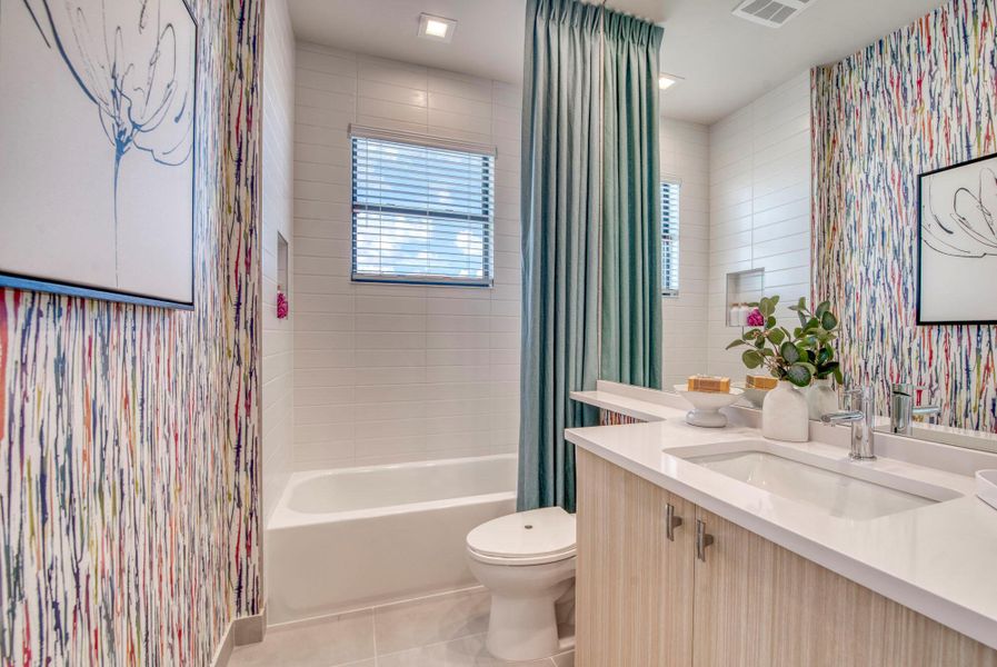 Furnished interior view inside a new home in Apex at Avenir, Palm Beach Gardens (Image 6).