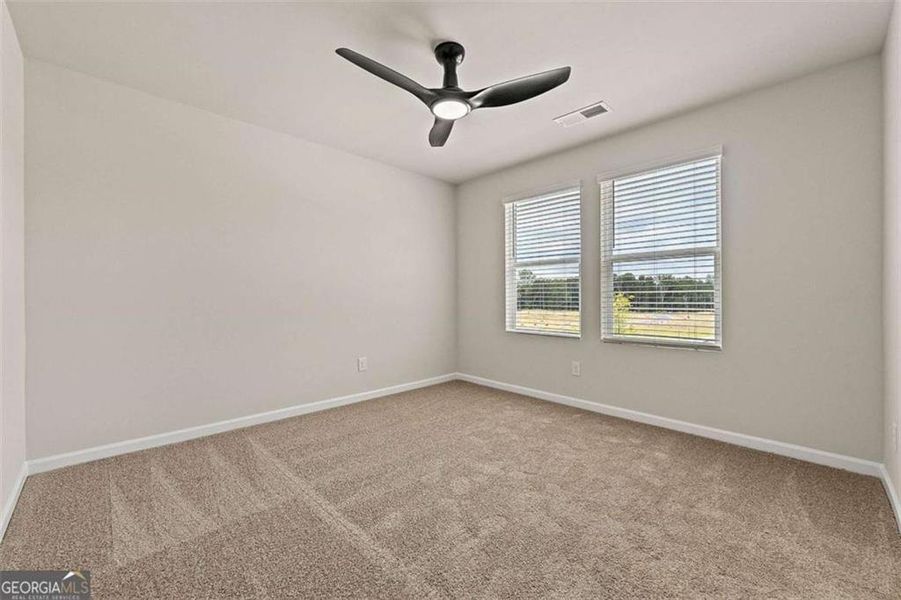 Spacious, unfurnished interior of a new home in The Grove At Mundy Mill, Gainesville (Image 13).