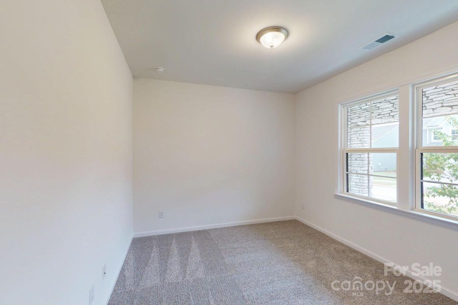 Main level secondary bedroom Main level secondary bedroom