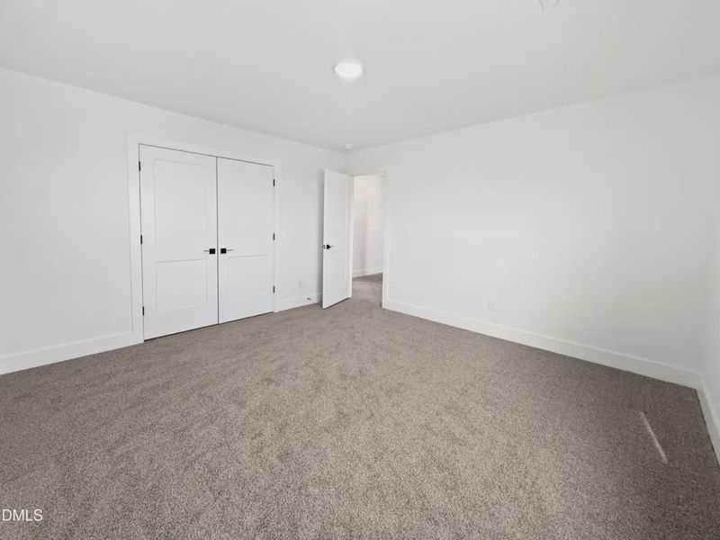 Spacious, unfurnished interior of a new home in Charlotte's Ridge, Middlesex (Image 24).