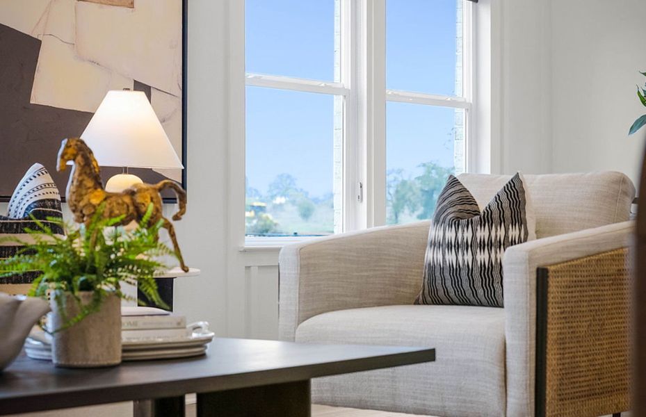 Representative furnished interior of a home built from the Compass by Del Webb in Del Webb Austin at Lost Pines, Bastrop (Image 7).