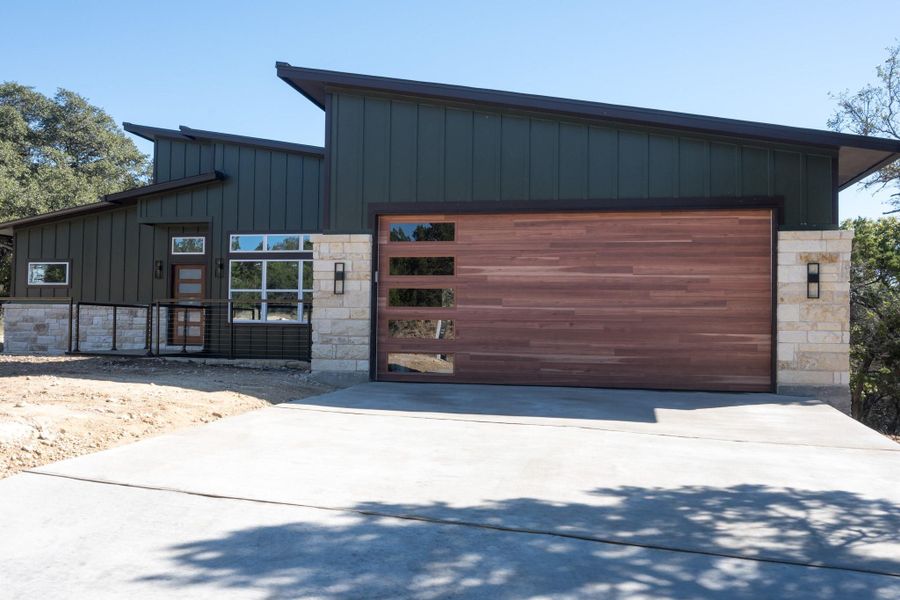 Welcome to 3013 Clark Ave.  Oversized 2 car garage with EV Charging.