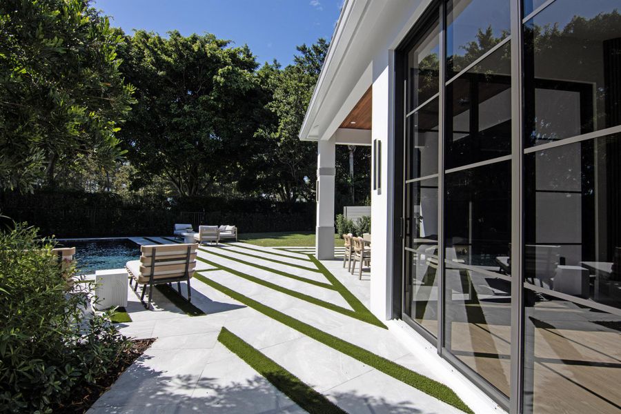 Exterior details and patio area of a home in , Wellington (Image 33).