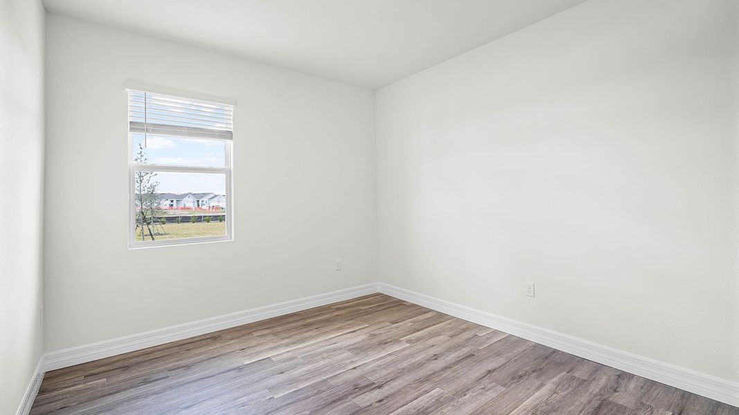 Spacious, unfurnished interior of a new home in Harmony on Lake Eloise, Winter Haven (Image 27).