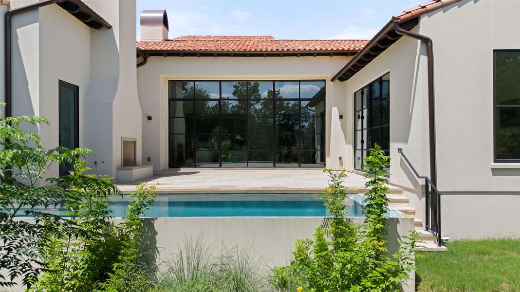 Front exterior of a new home in Amarra Villas, Austin, TX, highlighting curb appeal (Image 21). Front exterior of a new home in Amarra Villas, Austin, TX, highlighting curb appeal (Image 21).