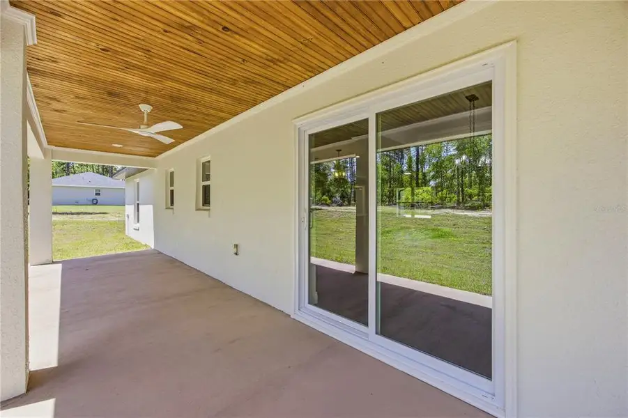Exterior details and patio area of a home in , Ocala (Image 27).