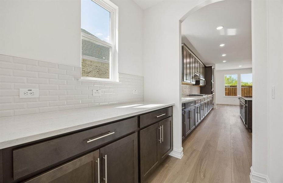 Butlers pantry with additional cabinet space