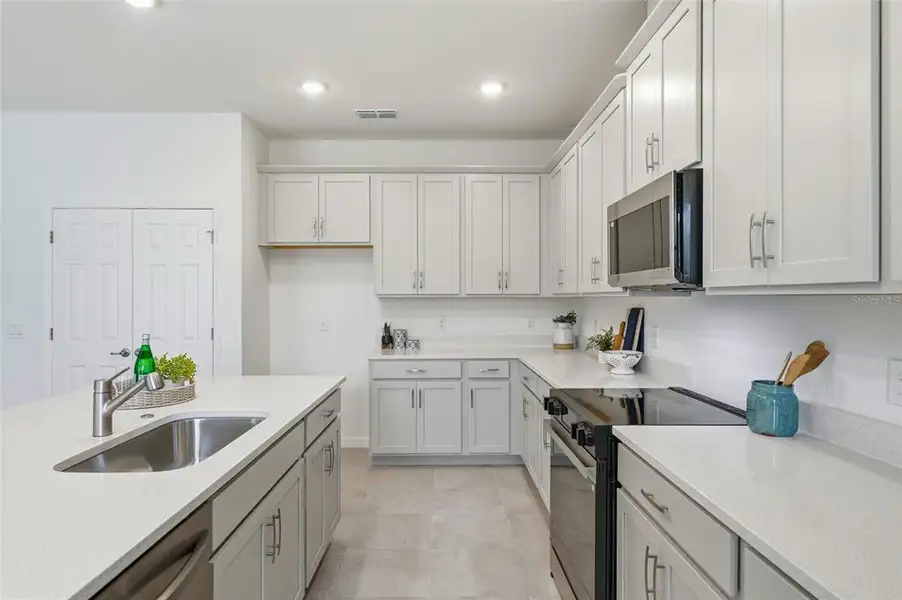 Furnished interior view inside a new home in Trinity Place, St. Cloud (Image 10).