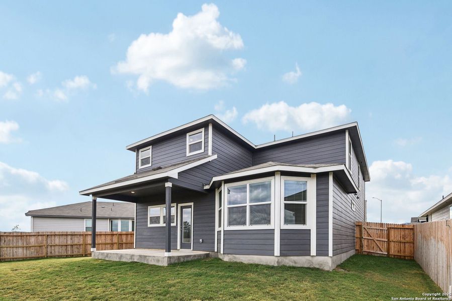 Exterior details and patio area of a home in Estancia Ranch - Premier Series, San Antonio (Image 24). Exterior details and patio area of a home in Estancia Ranch - Premier Series, San Antonio (Image 24).