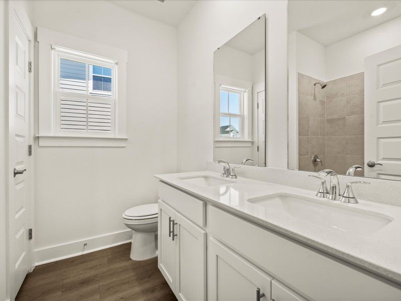 Furnished interior view inside a new home in The Coves at Lakes of Cane Bay, Summerville (Image 10).