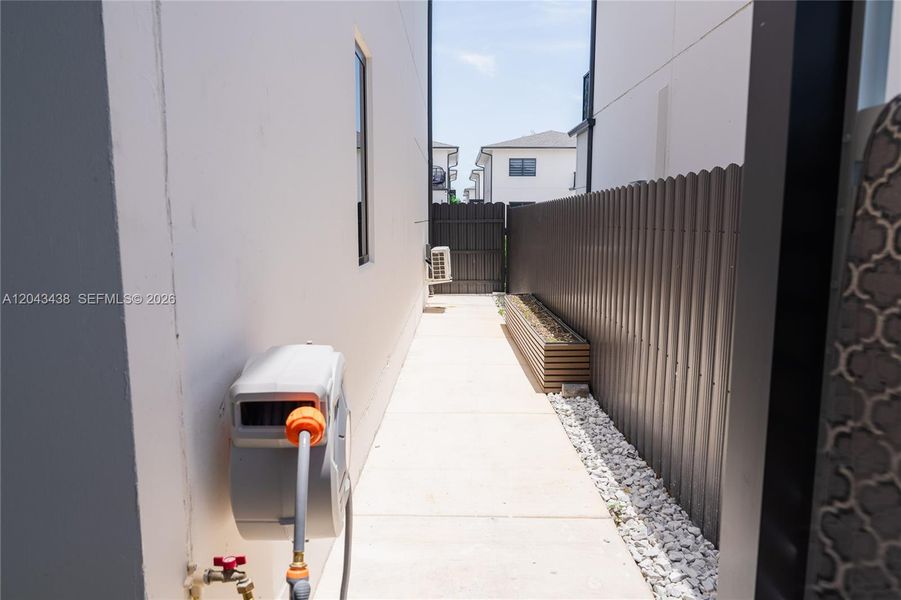 Exterior details and patio area of a home in , Florida City (Image 26).
