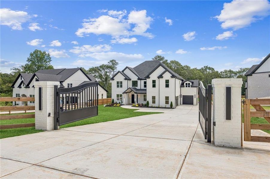 Front exterior of a new home in , Hoschton, GA, highlighting curb appeal (Image 25). Front exterior of a new home in , Hoschton, GA, highlighting curb appeal (Image 25).