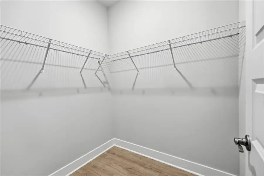 Generous wire shelving wraps around this spacious