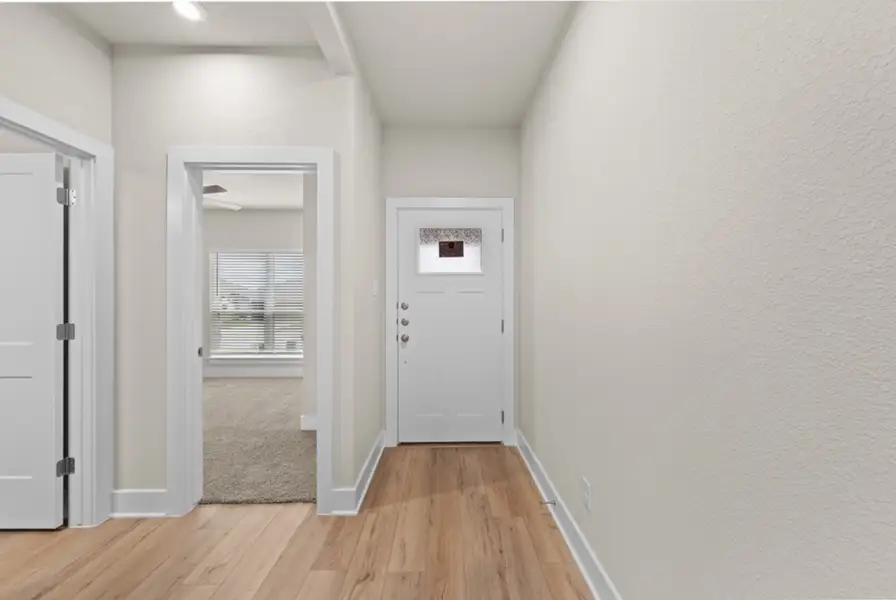 Representative unfurnished interior of a home built from the Riley by Omega Builders in Hartrick Ranch, Temple (Image 13).