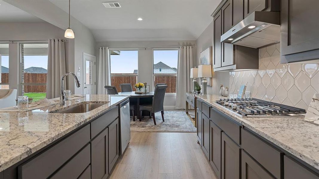 Kitchen - All Home and community information, including pricing, included features, terms, availability and amenities, are subject to change at any time without notice or obligation. All Drawings, pictures, photographs, video, square footages, floor plans, elevations, features, colors and sizes are approximate for illustration purposes only and will vary from the homes as built.