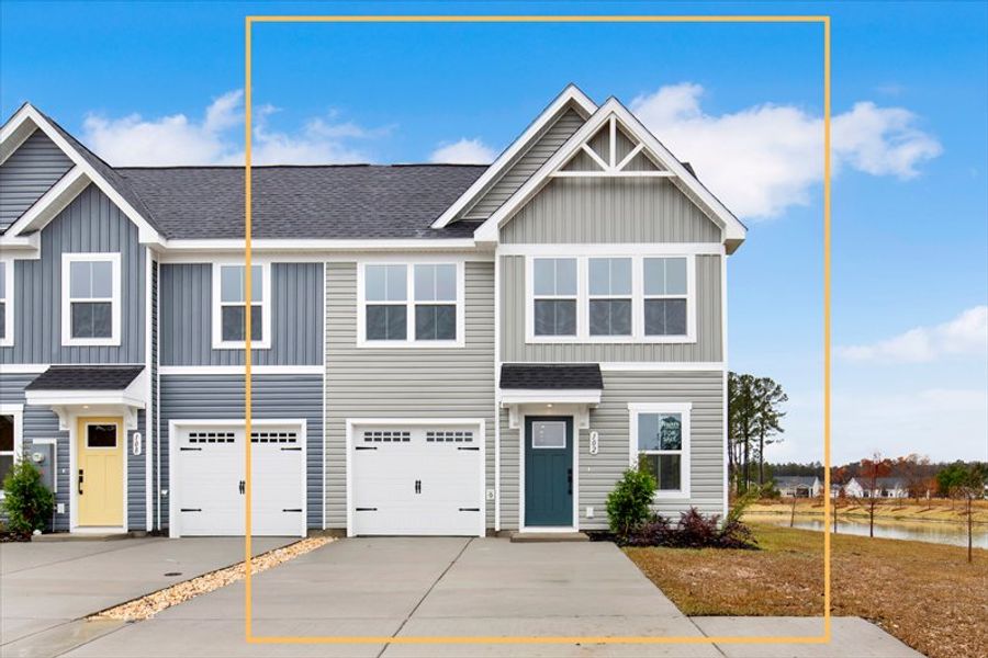 Front exterior of a new home in Cobblestone at East Argent, Hardeeville, SC, highlighting curb appeal (Image 1).