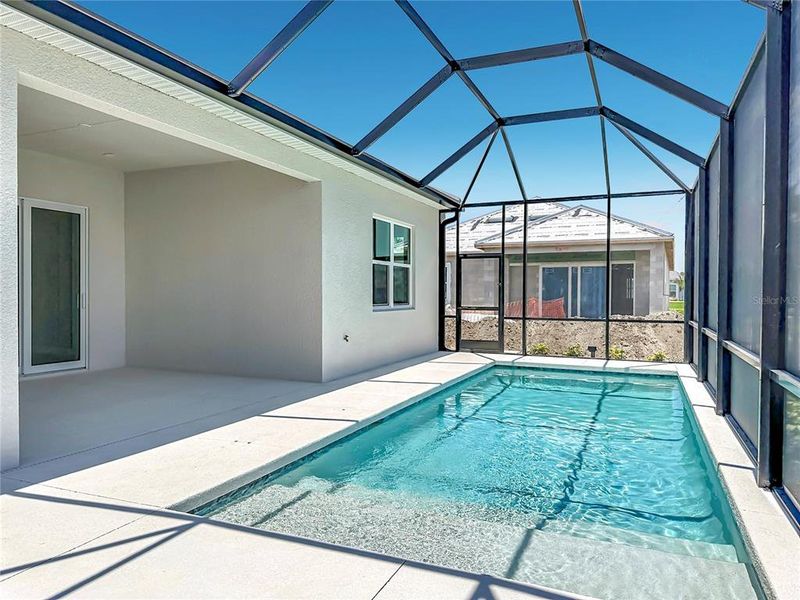 Exterior details and patio area of a home in Watercolor Place, Bradenton (Image 23).