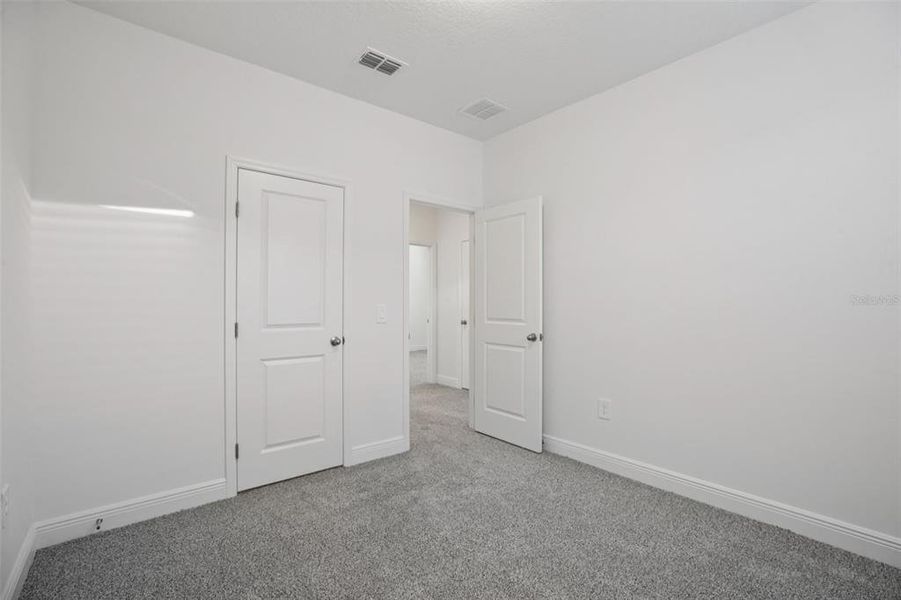 Spacious, unfurnished interior of a new home in Cyrene at Minneola - Villas, Minneola (Image 26).