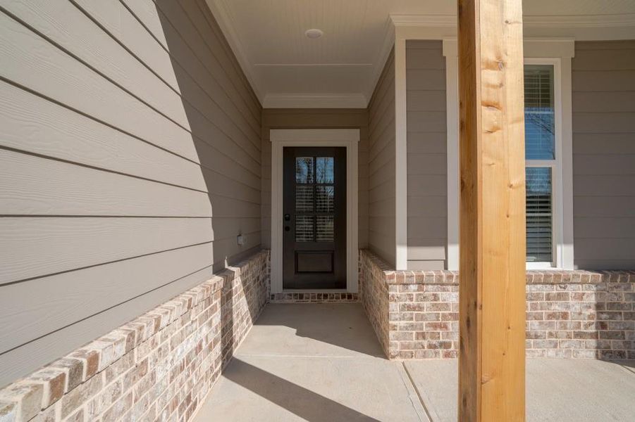 Exterior details and patio area of a home in Magnolia Ridge, Monroe (Image 23).