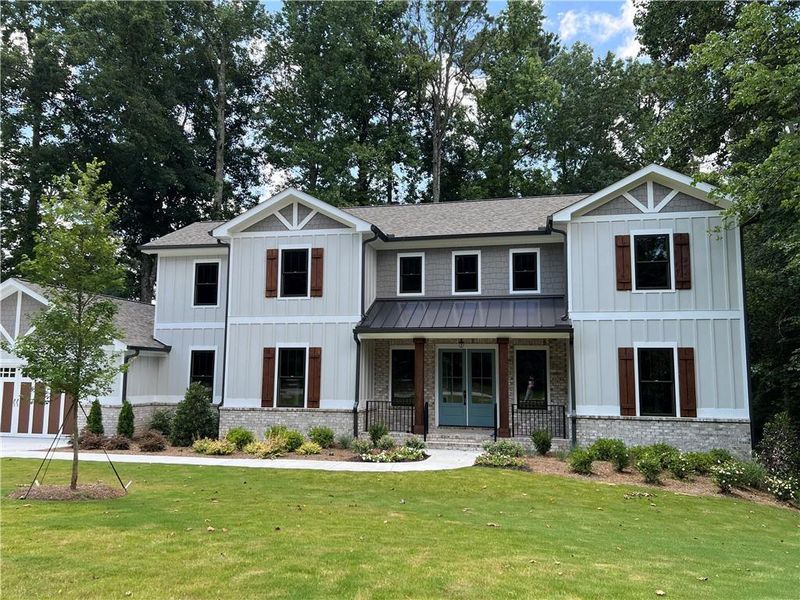 Front exterior of a new home in , Buford, GA, highlighting curb appeal (Image 28).