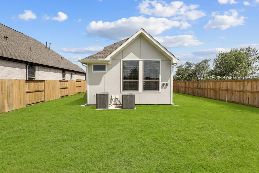 Exterior details and patio area of a home in Bridgeland, Cypress (Image 4).