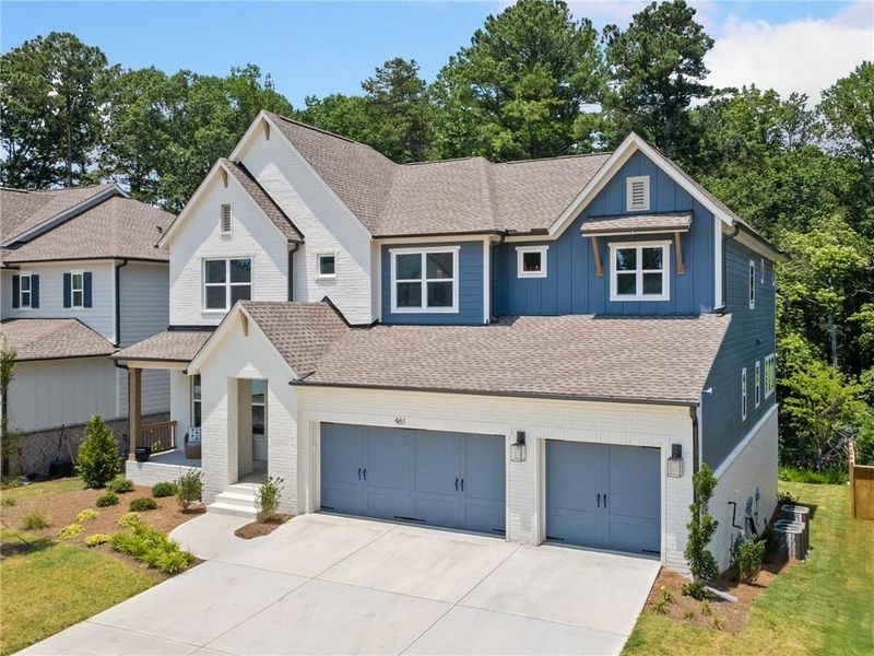 Front exterior of a new home in , Woodstock, GA, highlighting curb appeal (Image 26). Front exterior of a new home in , Woodstock, GA, highlighting curb appeal (Image 26).