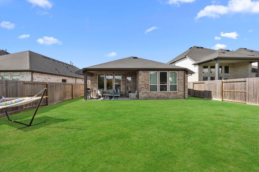 Exterior details and patio area of a home in , Fulshear (Image 20).