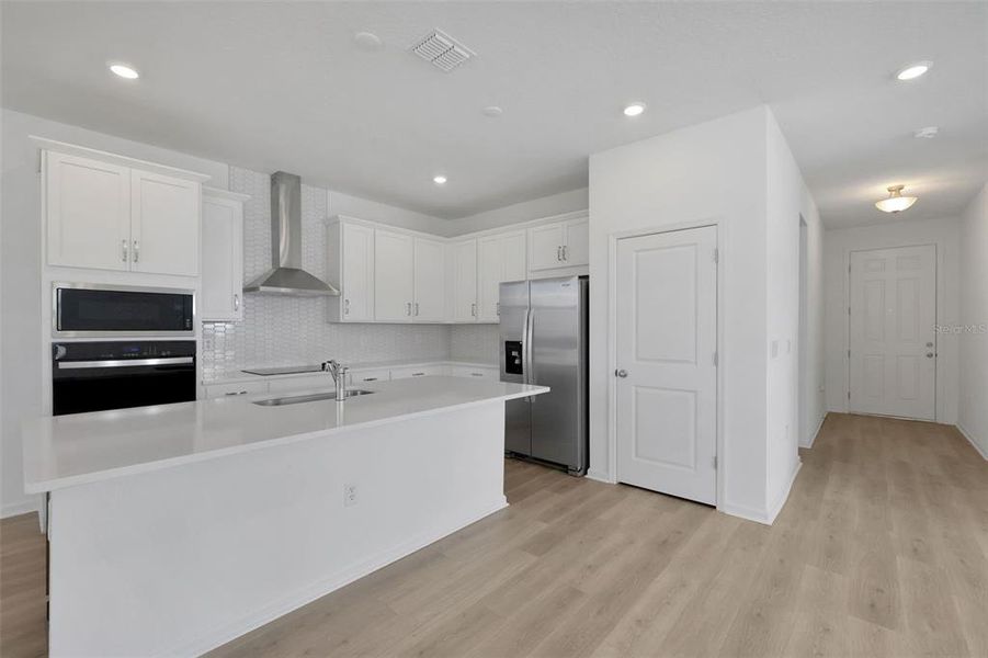 Furnished interior view inside a new home in Crossroads at Kelly Park, Apopka (Image 7).