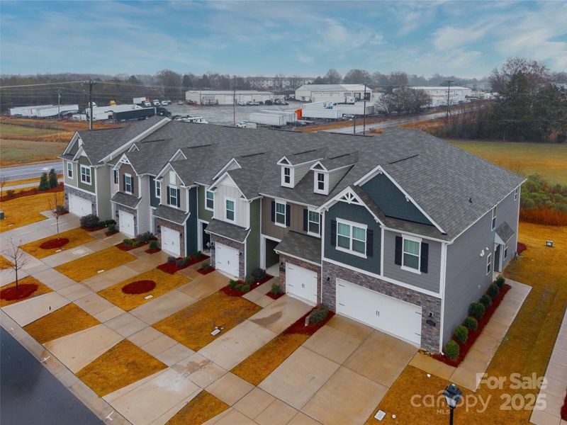 Front exterior of a new home in Secrest Landing, Monroe, NC, highlighting curb appeal (Image 25). Front exterior of a new home in Secrest Landing, Monroe, NC, highlighting curb appeal (Image 25).