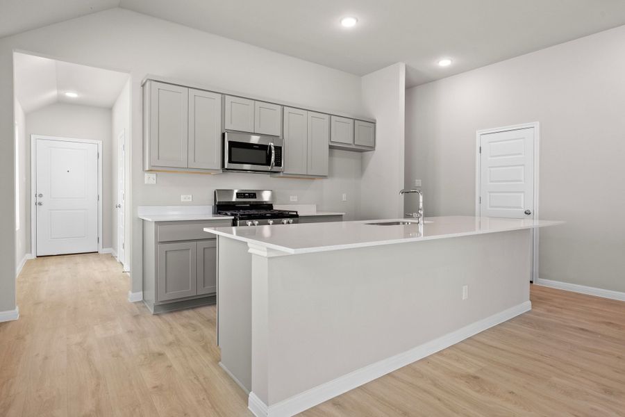 Kitchen in the Spruce home plan by Trophy Signature Homes - REPRESENTATIVE PHOTO Kitchen in the Spruce home plan by Trophy Signature Homes - REPRESENTATIVE PHOTO