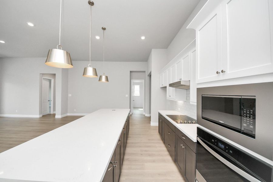 Furnished interior view inside a new home in Bridgeland: Heritage Collection, Cypress (Image 7). Furnished interior view inside a new home in Bridgeland: Heritage Collection, Cypress (Image 7).