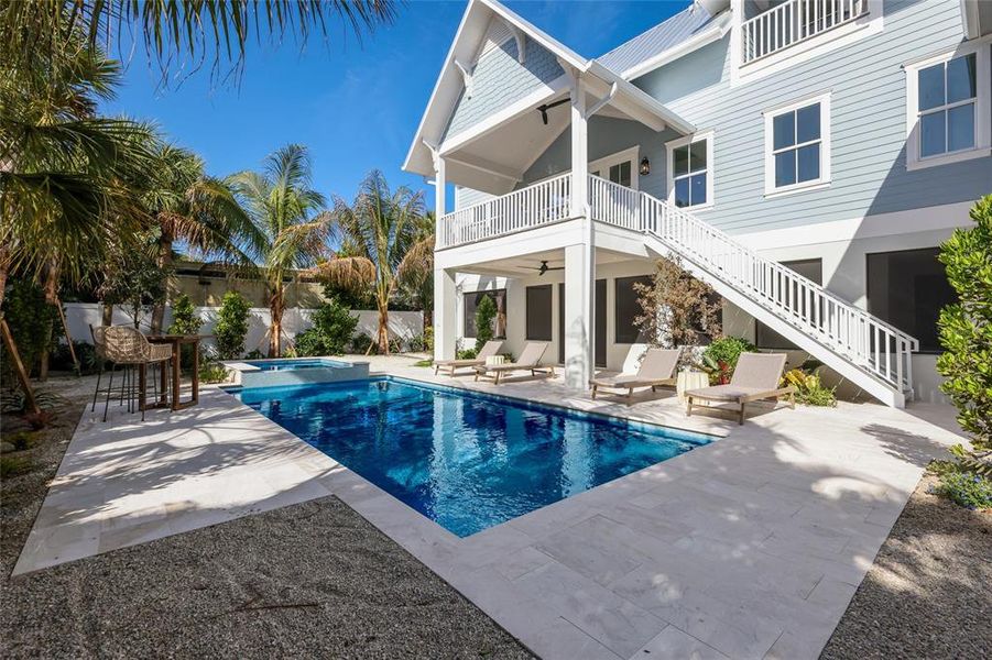 Exterior details and patio area of a home in , Anna Maria (Image 31).