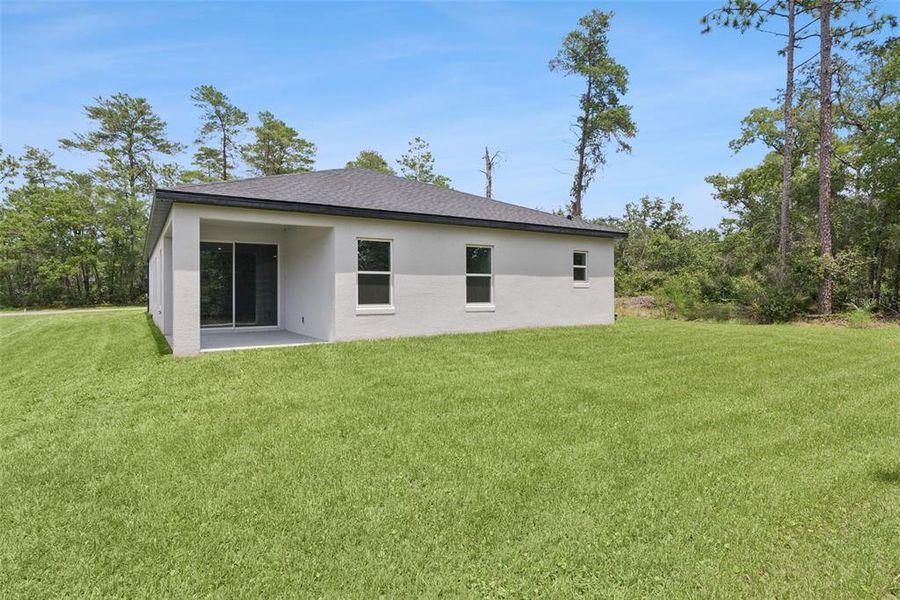 Exterior details and patio area of a home in , Ocala (Image 3).