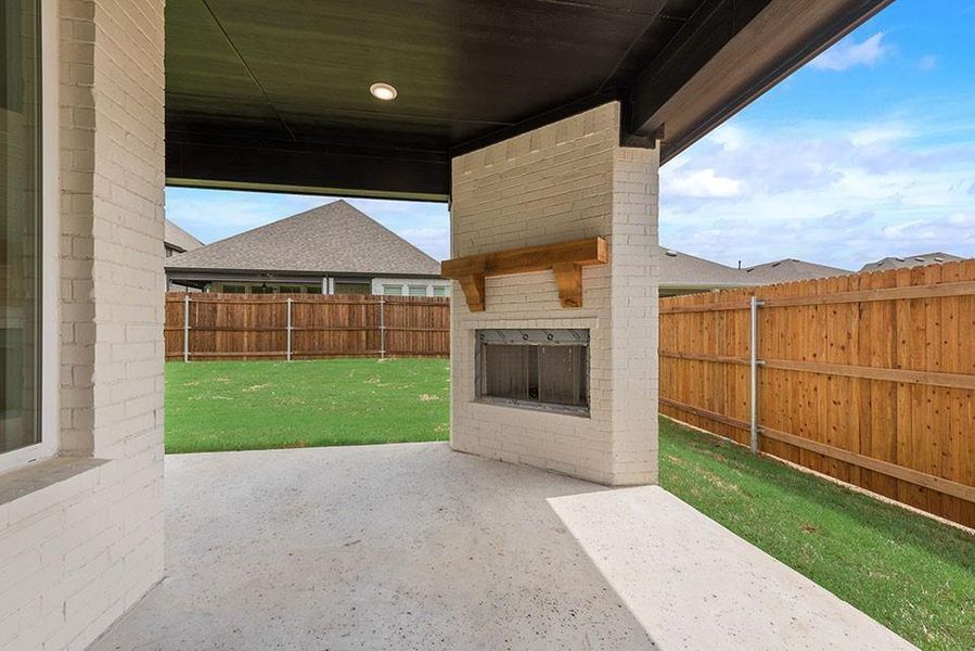 Exterior details and patio area of a home in Tavolo Park, Fort Worth (Image 3).