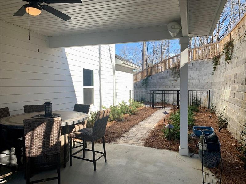 Exterior details and patio area of a home in Holiday Pines, Buford (Image 23).