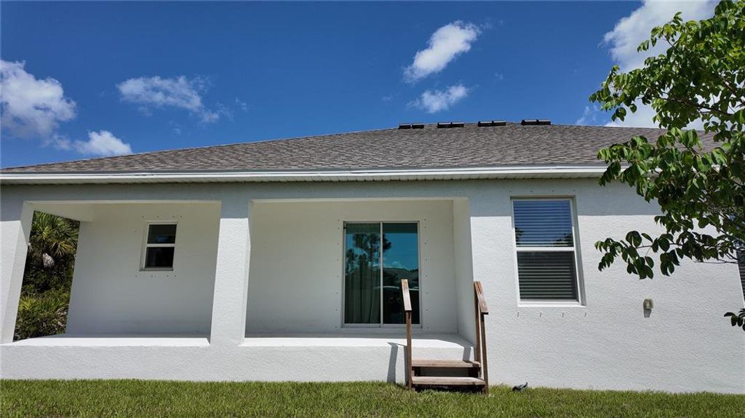 Exterior details and patio area of a home in South Gulf Cove, Port Charlotte (Image 23). Exterior details and patio area of a home in South Gulf Cove, Port Charlotte (Image 23).