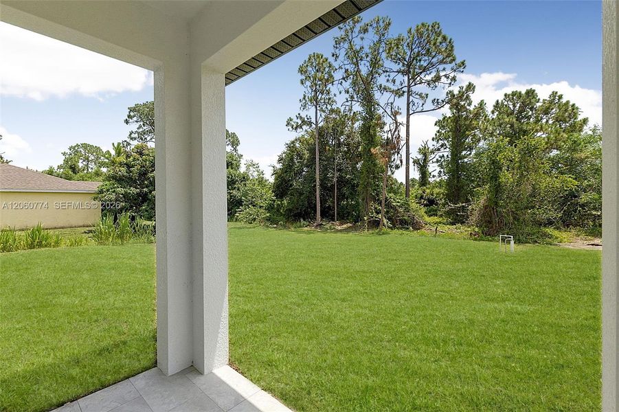 Exterior details and patio area of a home in , Lehigh Acres (Image 3). Exterior details and patio area of a home in , Lehigh Acres (Image 3).