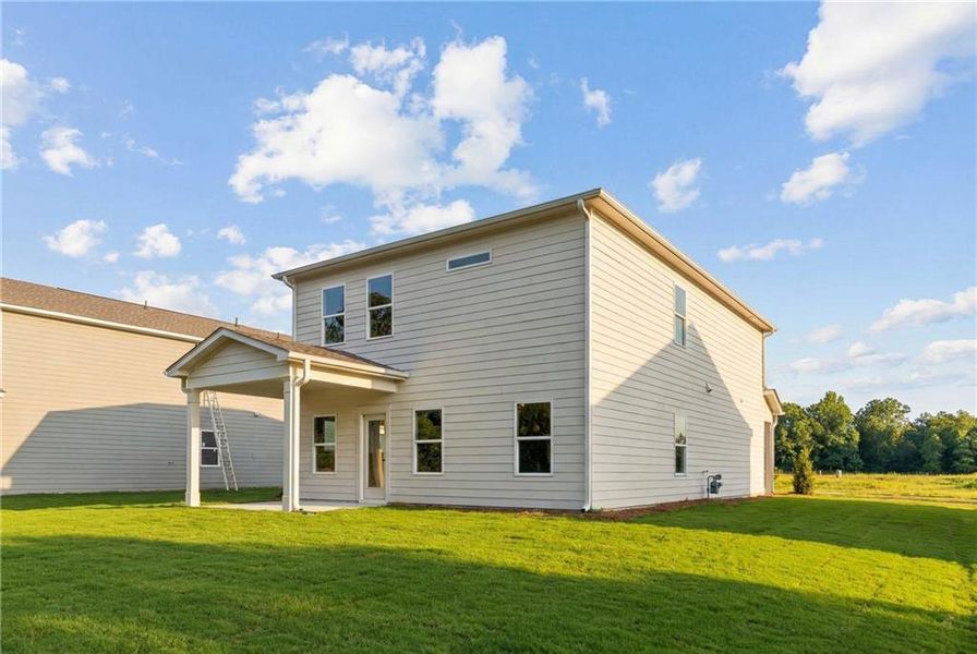 Exterior details and patio area of a home in The Bluffs, Canton (Image 4). Exterior details and patio area of a home in The Bluffs, Canton (Image 4).