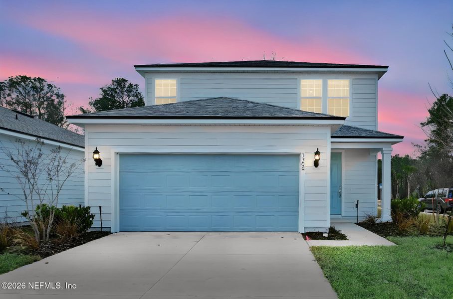 Front exterior of a new home in Murray Farms, Middleburg, FL, highlighting curb appeal (Image 27).