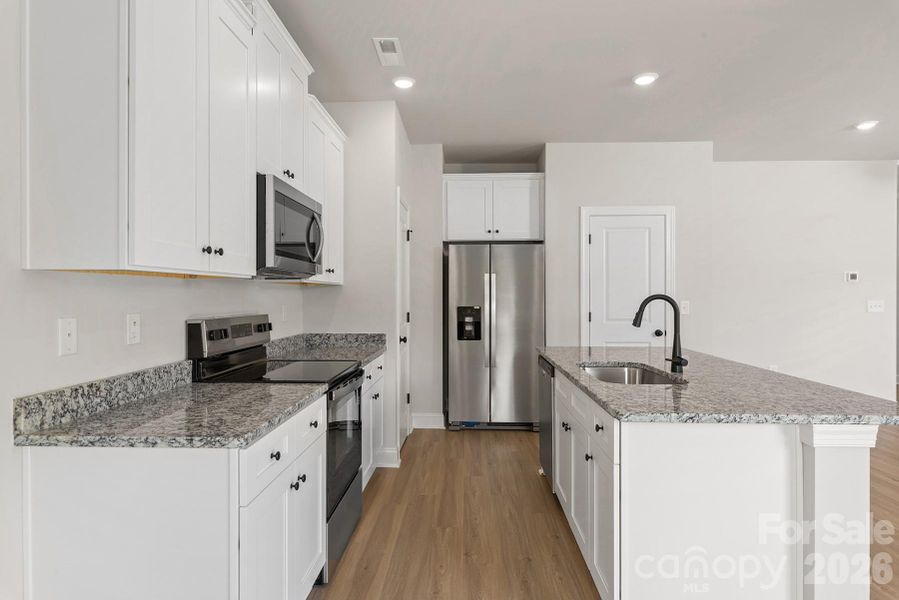 Furnished interior view inside a new home in Ascot Woods, Charlotte (Image 5).